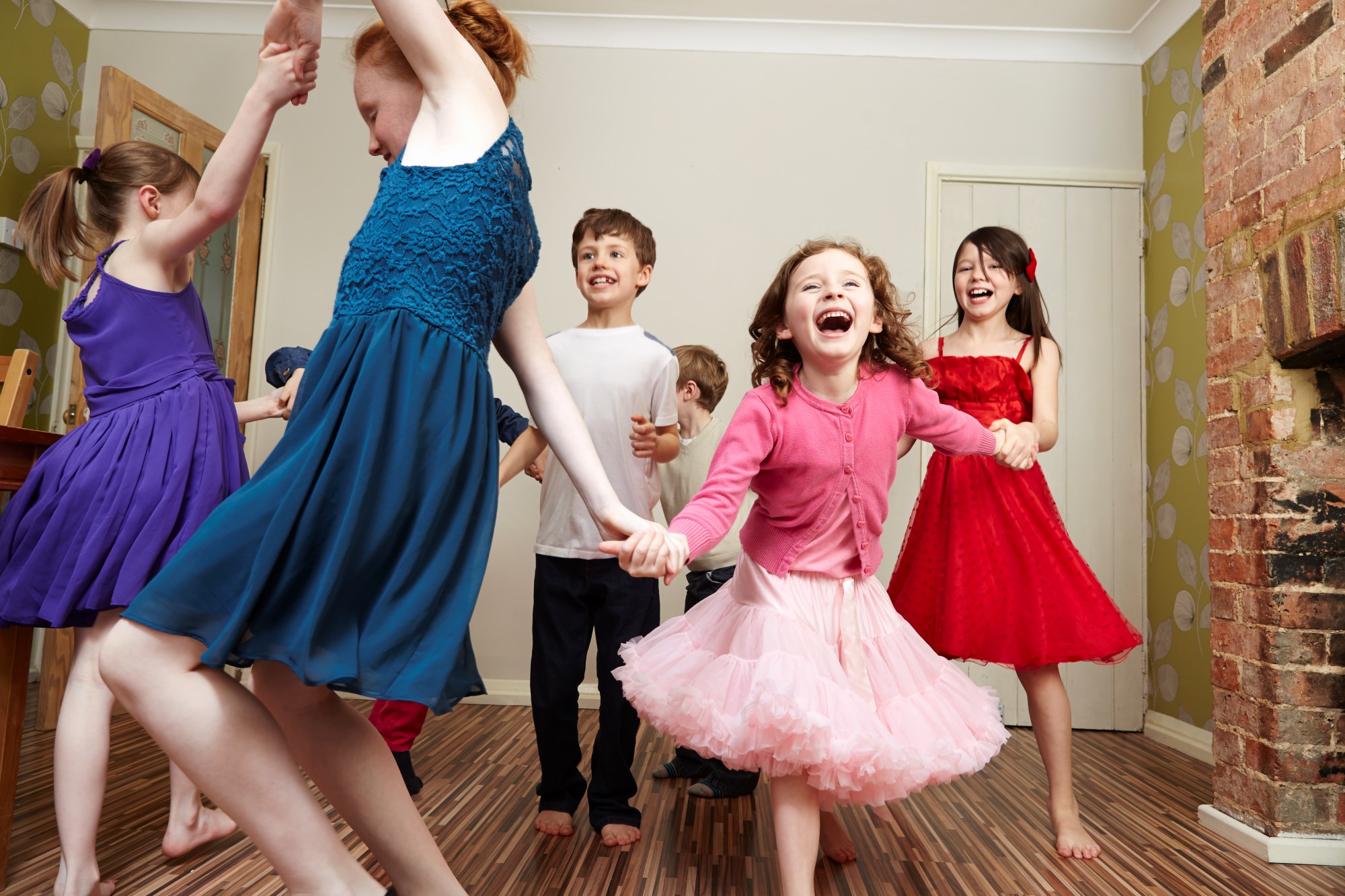Children dancing at birthday party