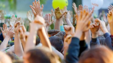 hands up teenagers as the concert cheering up for 2022 11 14 05 04 53 utc